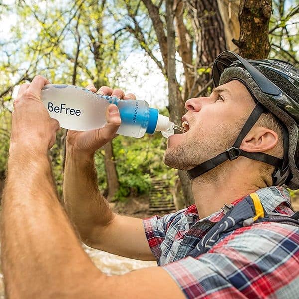 A man drinking fom Katadyn BeFree water filter