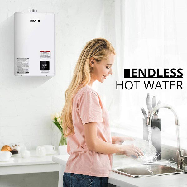 A lady doing the dishes using hot water from the faucet with the help of one of the best gas tankless water heater