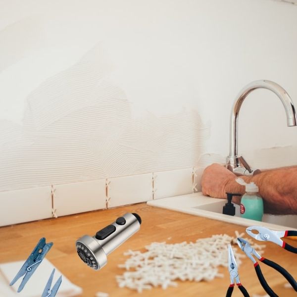 Cleaning a pull-down kitchen faucet spray head