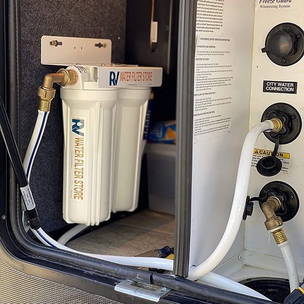 Essential rv water filter system with hose fittings installed for in caravan