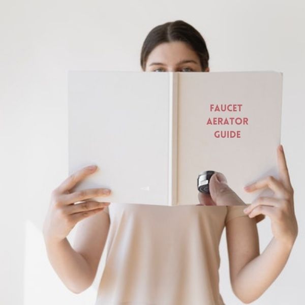 Woman reading a book with a title Faucet Aerator Guide