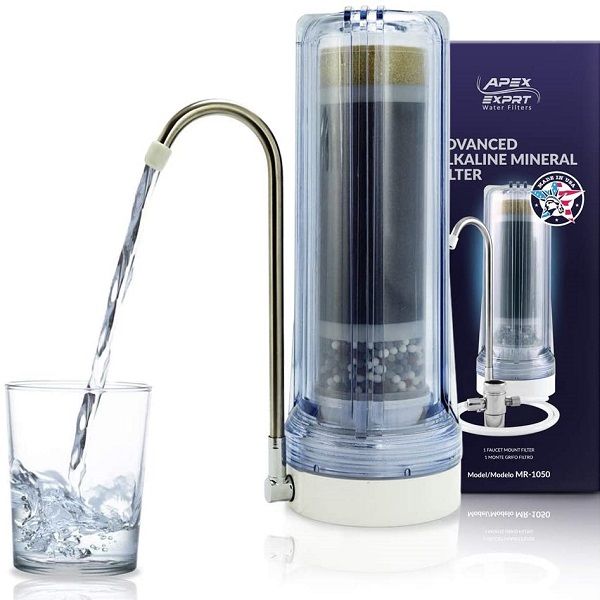 APEX Countertop Water Filter filling glass with water