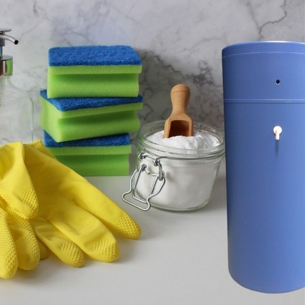 Water softener cleaning materials and a resin tank