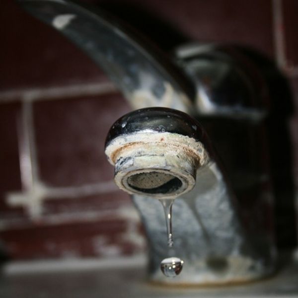 calcium magnesium on old faucet drain