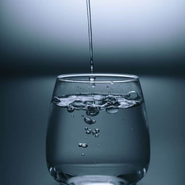 glass of water fresh from a uv filter systems